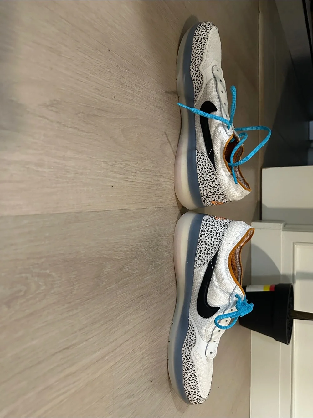Nike Low-Top Sneakers in White with Black Swoosh and Turquoise Laces